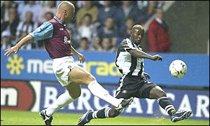 Newcastle's Lomana LuaLua scores the first goal of the game