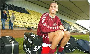 Peter Lovenkrands rests during training at Dumbarton's Strathclyde Homes Stadium