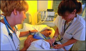 Nurses with patient