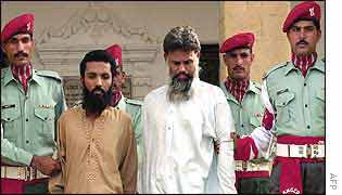 Suspects Mohammad Hanif, left, and Mohammad Imran Bhai at news conference