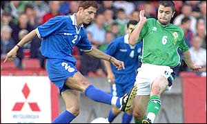 Damien Johnson (right) challenges Petros Fonnafis as Sammy McIlroy's Northern Ireland get a goalless draw against Cyprus at Windsor Park, Belfast