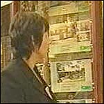 Single lady looking at houses