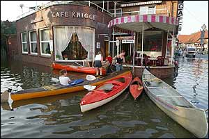 German youth visit an ice-cream parlour by boat in Lower Saxony