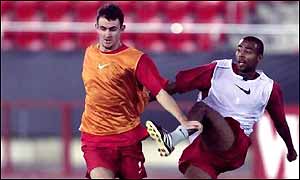 Arsenal's Francis Jeffers trains with team-mate Ashley Cole