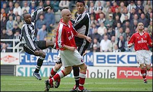 Newcastle striker Lomana LuaLua scores in a Premiership game against Charlton