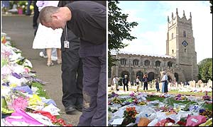 Member of the public reading floral tributes outside the Soham church
