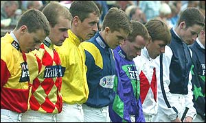 A minute's silence is conducted at Newmarket, Cambridgeshire