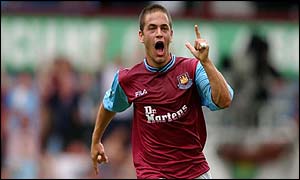 Joe Cole celebrates his opening strike