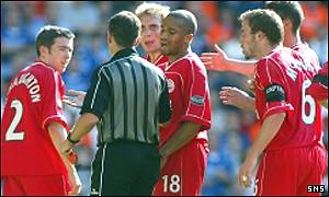 Kevin McNaughton (left) is sent off by John Underhill