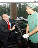 Richard Armitage (l) arrives at Beijing hotel
