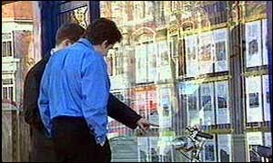 Man outside estate agents