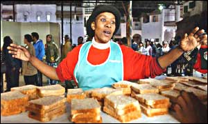 A volunteer working at the Landless Village at the Johannesburg summit - AFP