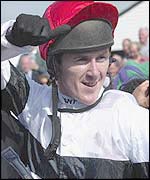 Tony McCoy celebrates his record 