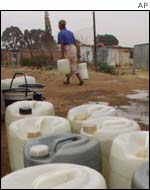 Woman collecting water