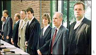 Defendants Madeyski (2nd rt), Fischer (4th lt) and Murawa (2nd lt) and lawyers