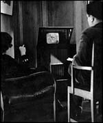 A couple watching TV