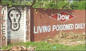 Graffiti on Union Carbide factory wall, now owned by Dow Chemical