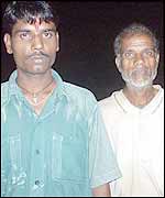 Son (L) and father, both gas victims