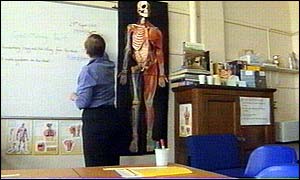 Teacher Jane Hanson prepares for lessons in her classroom