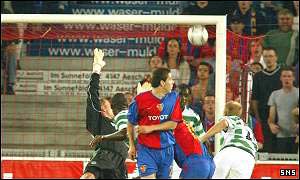 Rab Douglas cannot cover the ground in time and can only watch as Yakin makes it 2-0