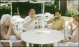 family having a drink in pub garden