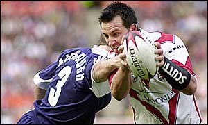Paul Sculthorpe takes on the Wigan defence