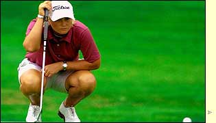 Becky Morgan lines up a putt on the ninth green in her opening round