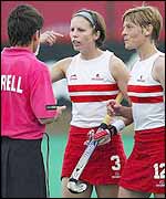 England's hockey team protest to the referee