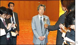 Koizumi tells reporters that he has decided to visit North Korea on 17 September 