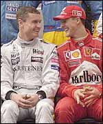 David Coulthard and Michael Schumacher share a joke