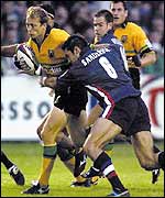 Sale's Alex Sanderson tackles Northampton's Matt Dawson