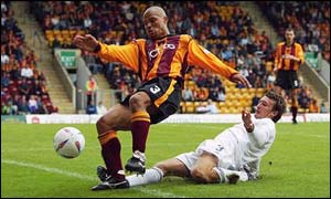Bradford players like Andy Myers (left) will be paid for the first time in nearly four months