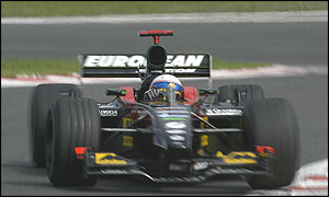 Anthony Davidson guides his Minardi around Spa