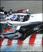 Kimi Raikkonen hurls his McLaren around Spa