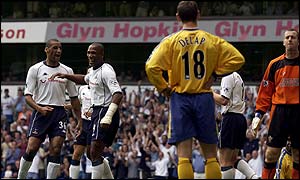 Les Ferdinand celebrates after scoring against Southampton