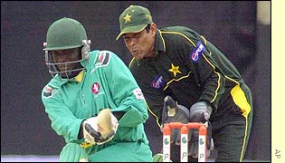 Kennedy Otieno sweeps square for runs