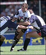 Bristol's Alex Brown and Ben Sturnham tackle Kyran Bracken