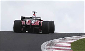 Michael Schumacher crests the brow at Raidillon during the 2002 Belgian Grand Prix