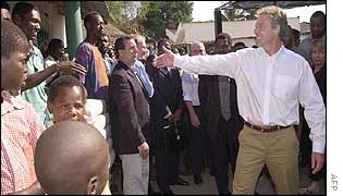 Tony Blair meets local people in a Mozambique village