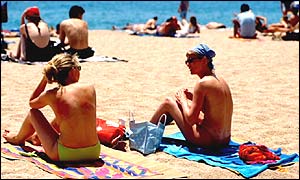 Holiday makers on Spanish beach