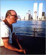 Tourist with Twin Towers in the background