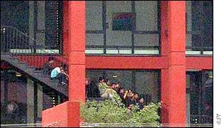 North Koreans on school staircase