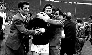 Scotland's Jim Baxter is mobbed by fans after the 1967 win over England
