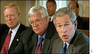 Democratic House minority leader Dick Gephardt (L), Republican Speaker of the House of Representatives Dennis Hastert (C) and President Bush (R)