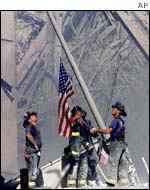 New York firefighters raising the flag on 11 September