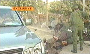 Attacker being tackled by security forces