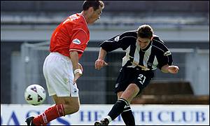 Phil Jevons (right) in action for Gtrimsby Town