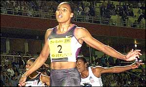 Marion Jones wins the women's 100m