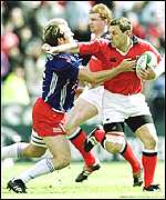Jason Holland (right) in Heineken Cup action for Munster last season
