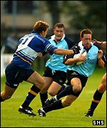 John Steel breaks through the Leinster defence